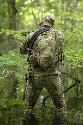 man in woods, Multicam backpack